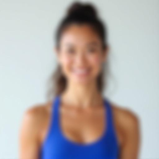 Professional headshot of Chloe Tam, a female fitness coach.